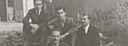 June, 1944. The textile factory's yard in Salonica. Sitting on the wood pile, from left, top row: Odysseus (Yiapitzoglou's cousin), Helias Doundoulakis, and Nicos Oreopoulos; foreground, Nikitas. Kyria Eleni's apartment is seen in the background with the shuttered windows.